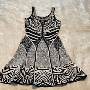 Diane Von Furstenberg short black and white print dress.  Stretchy material.